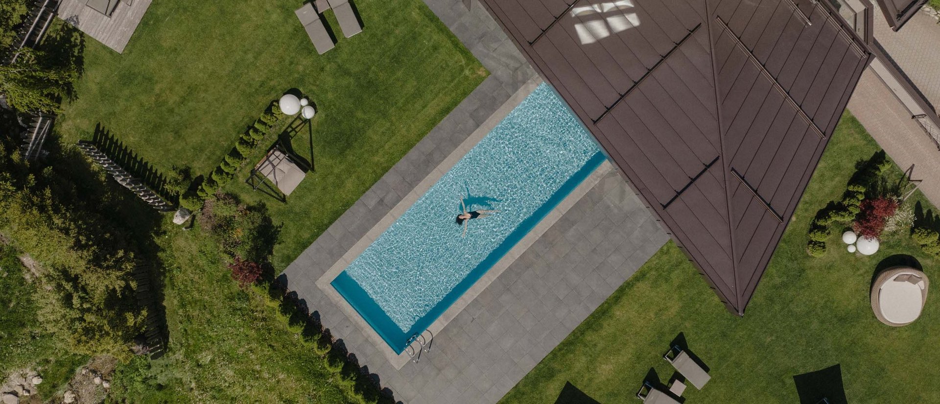Puro relax nel nostro hotel a Carezza con piscina